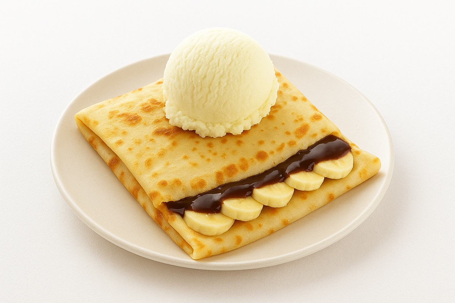 Блинчики с бананом, карамелью и ванильным мороженым